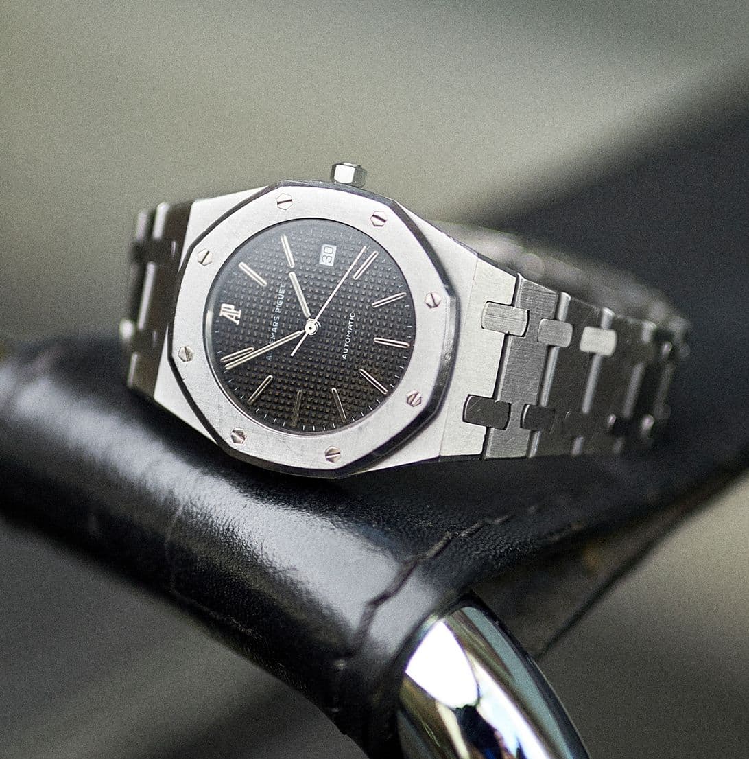 AUDEMARS PIGUET: A STAINLESS STEEL WRIST WATCH  Sold for £22,500