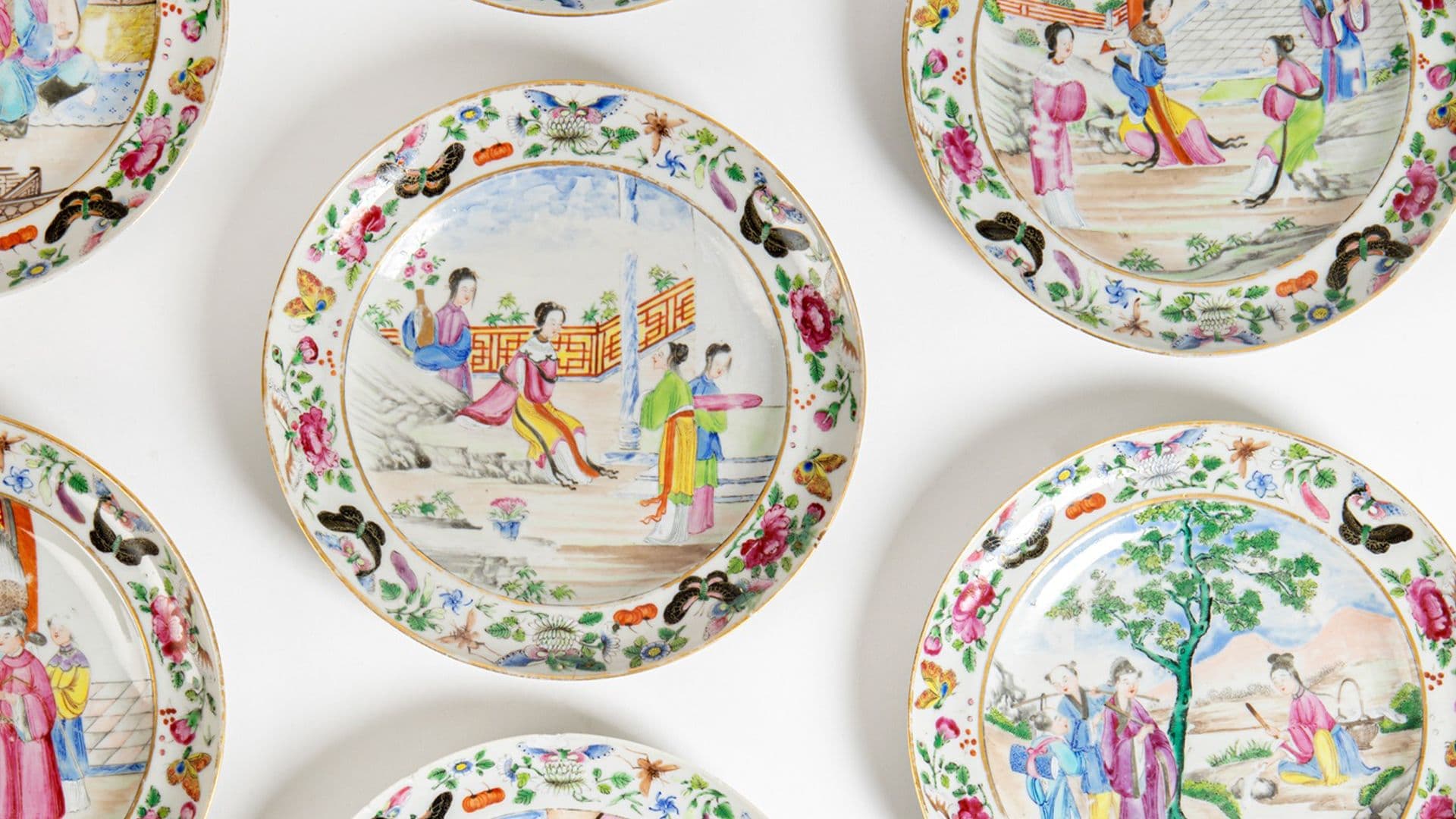 GROUP OF TEN FAMILLE ROSE 'LADY'S LIFE' DISHES | QING DYNASTY, 18TH-19TH CENTURY | 清 粉彩仕女生活圖蝶戀花盤(一組十件)| Sold for £2,375 incl premium